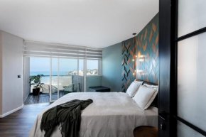 Sea View Stylish 1BR with Balcony by Beachfront Stay